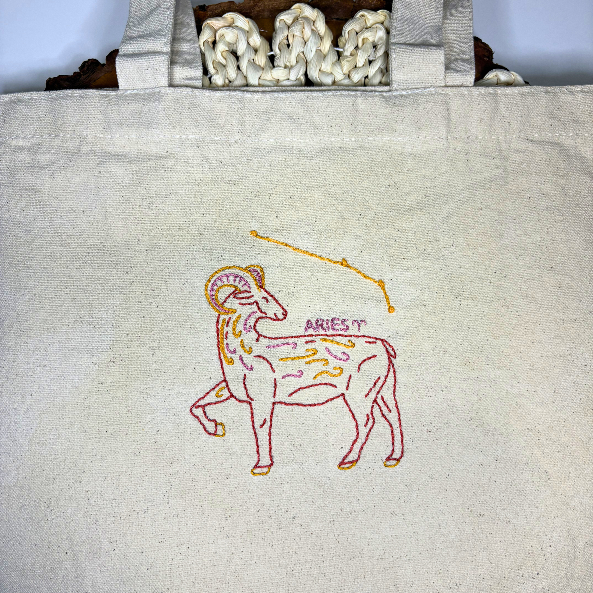 Completed Aries design embroidered tote bag.